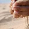H&auml;nde im Sand